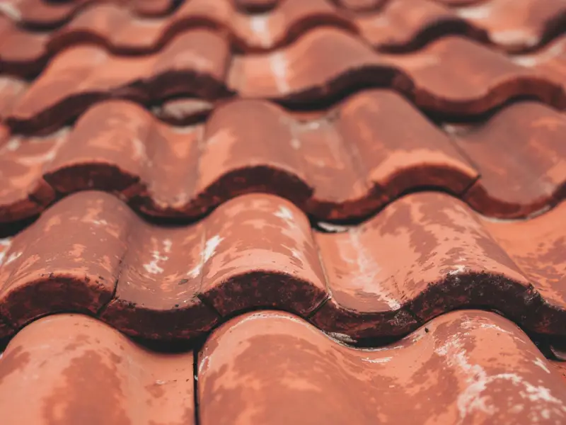 genteng tanah liat perumahan bmw